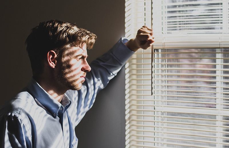 a man staring at the window